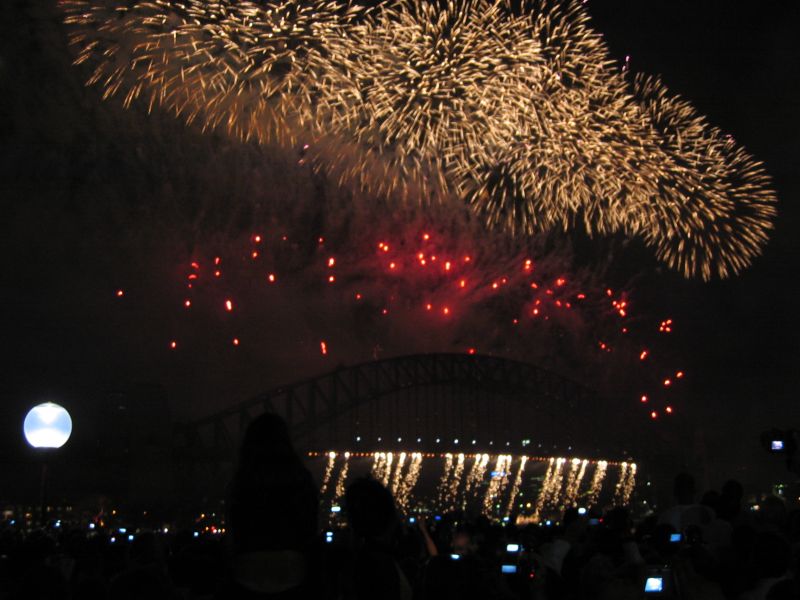 Sydney NYE '03 Fireworks, next is Sydney Harbour Bridge Search Lights